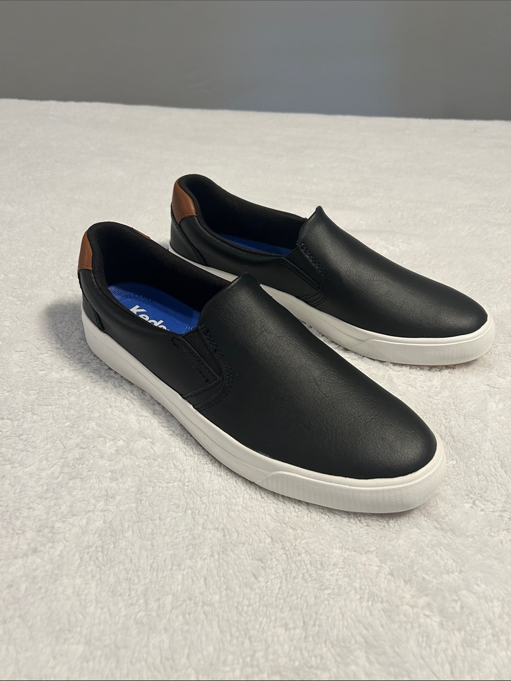 Keds woman Black Slip-On Leather Loafers with Brown Heel Accent. Size 7.5 M